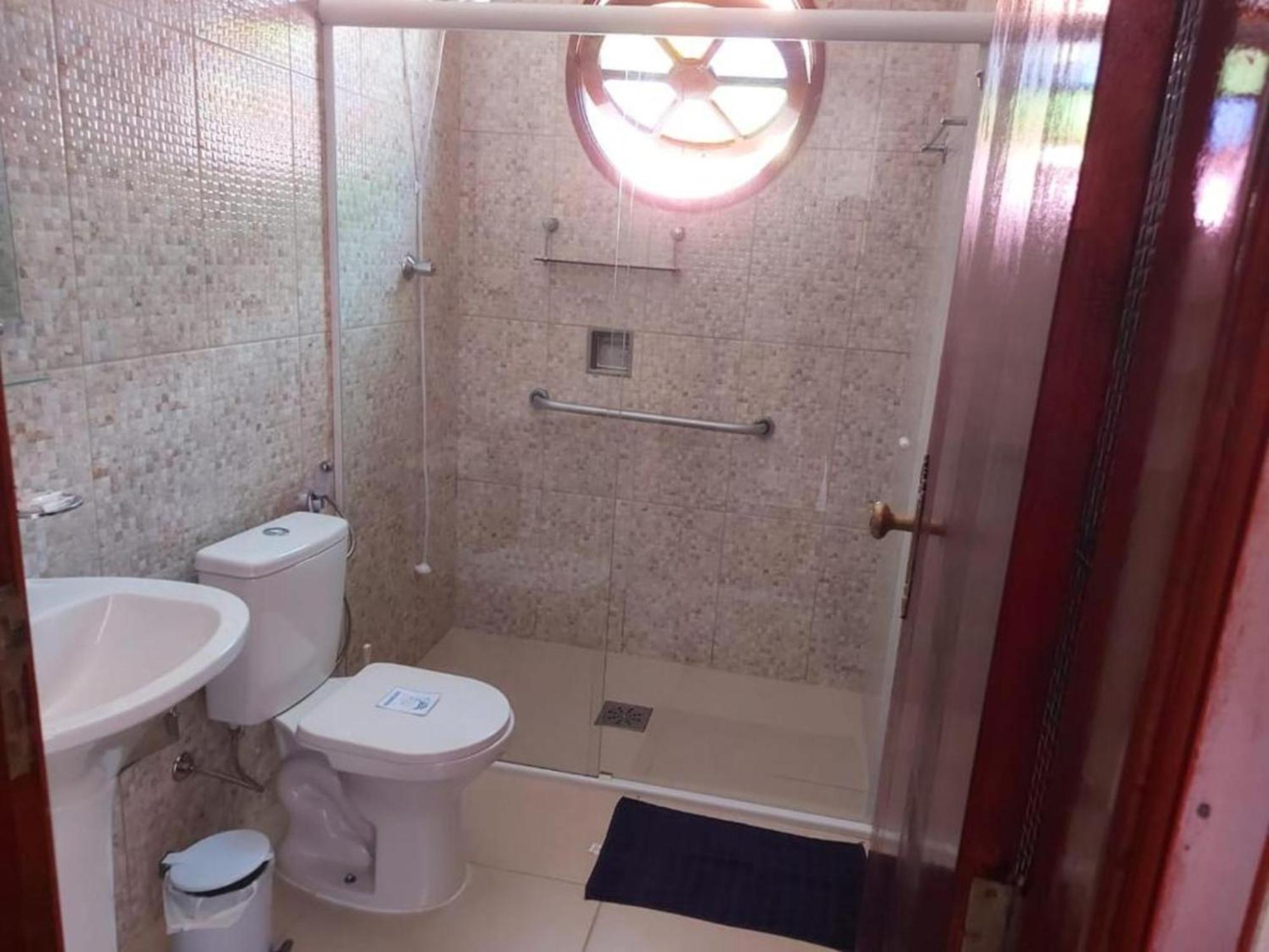 Casa Rosa de Peruíbe - Casa de Temporada 3 dormitórios, 10 hóspedes, piscina, wi-fi, netflix, 800 metros da praia Exterior foto