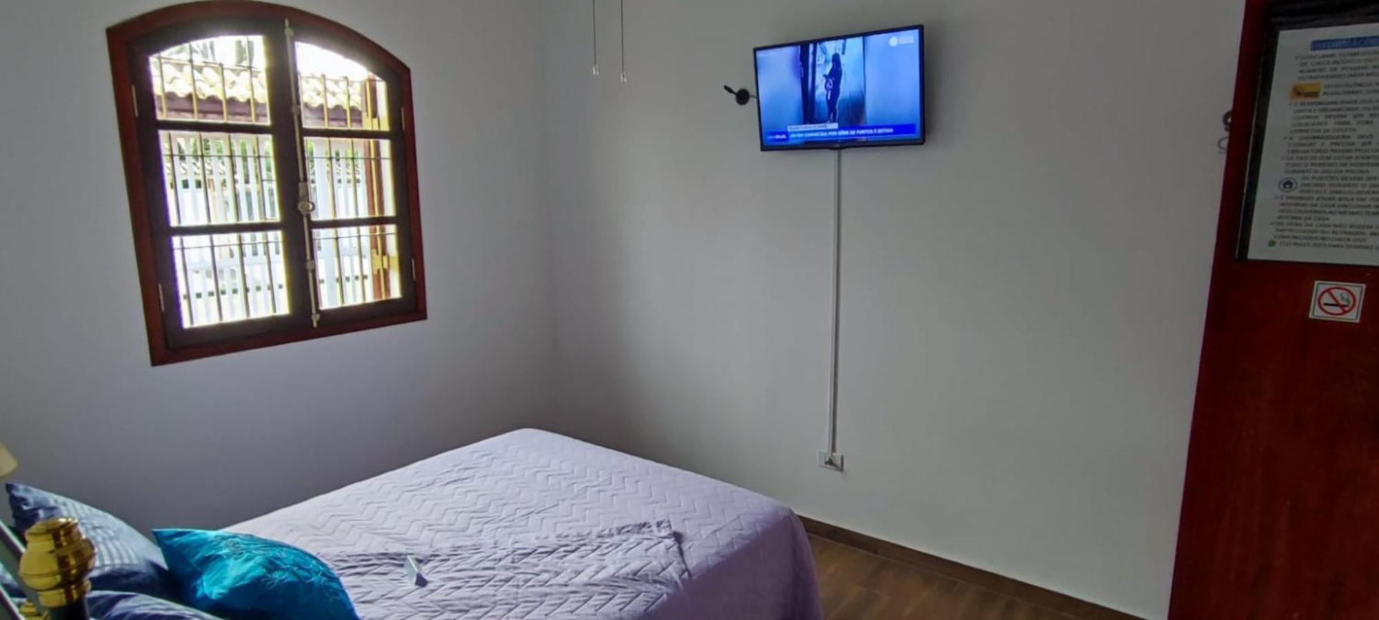 Casa Rosa de Peruíbe - Casa de Temporada 3 dormitórios, 10 hóspedes, piscina, wi-fi, netflix, 800 metros da praia Exterior foto