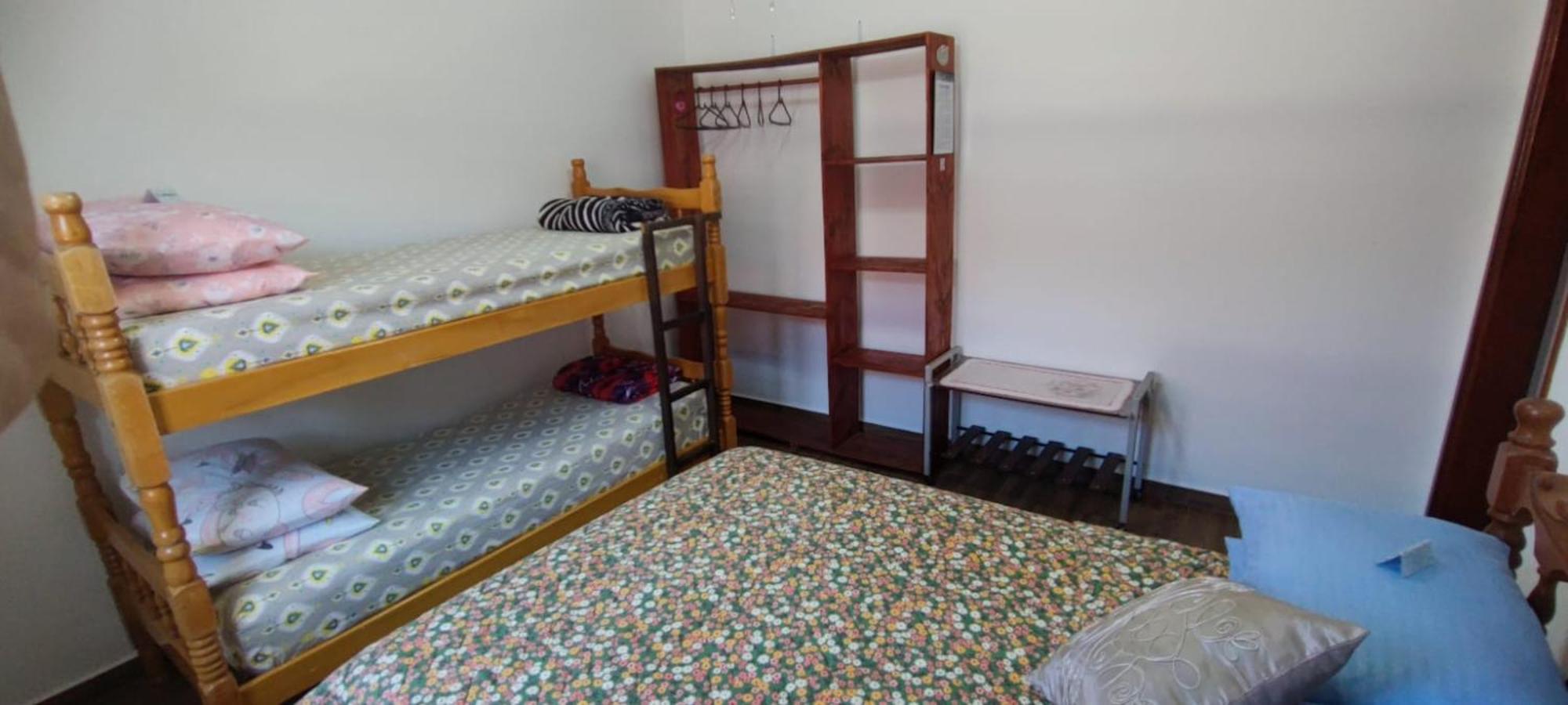 Casa Rosa de Peruíbe - Casa de Temporada 3 dormitórios, 10 hóspedes, piscina, wi-fi, netflix, 800 metros da praia Exterior foto